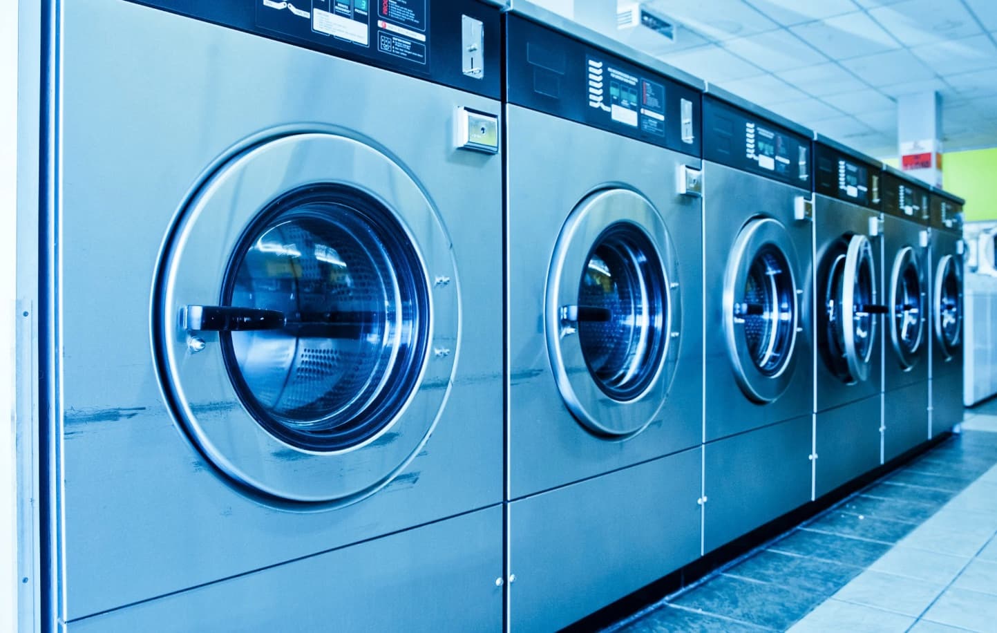 Industrial-grade commercial washing machines at H&M Laundrette — high-capacity, professional laundry equipment for businesses in South London